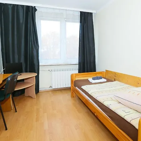 Quarto em Acomodações Particulares Goscinne *